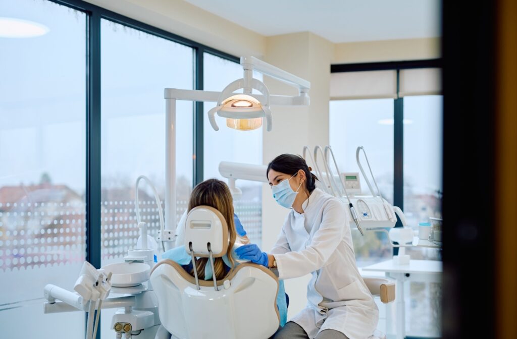 A dentist in Markham doing an exam on a patient's teeth.
